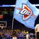 "Rumble", the Oklahoma City Thunder mascot, carries the team flag during a timeout against the Memphis Grizzlies in the second half of Game 7 of their second round Western Conference NBA basketball playoffs in Oklahoma City, Oklahoma May 15, 2011.